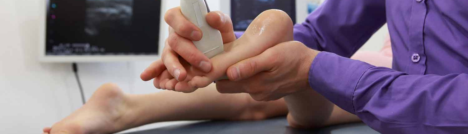 Podiatrist Working on Foot