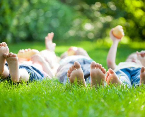Kids feet in grass